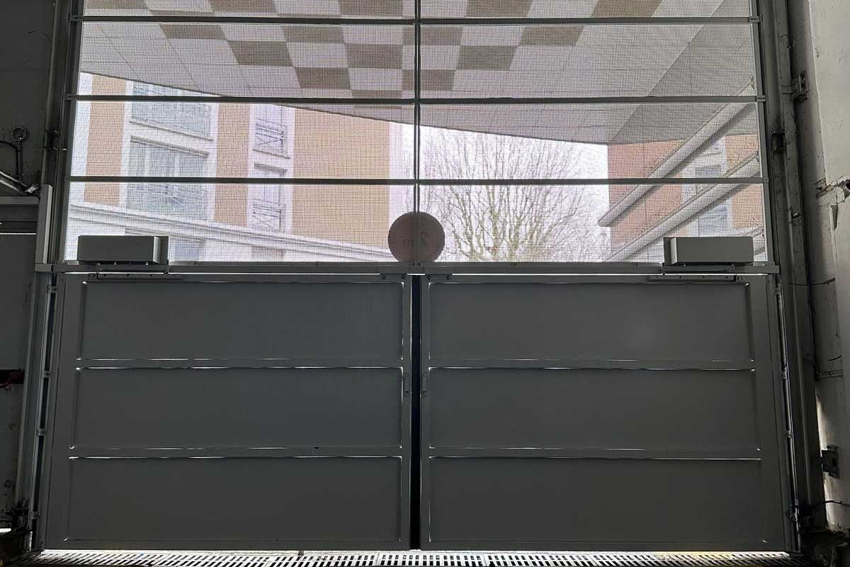 SERFA-Installation-porte-automatique-battante-à-Joinville-le-Pont-remplacement-dune-porte-grand-format-2 | SERFA 1982